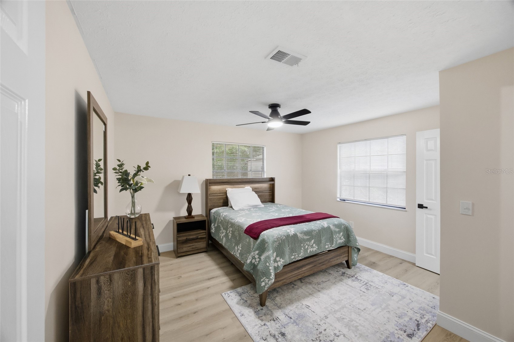 Comfortable bedroom with new flooring
