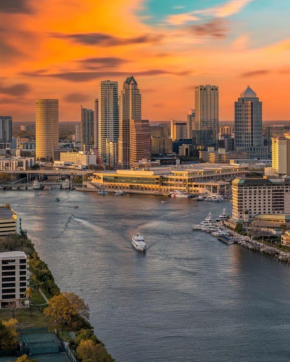 Tampa Bay skyline at sunset over the water